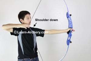 Bow-arm shoulder is down